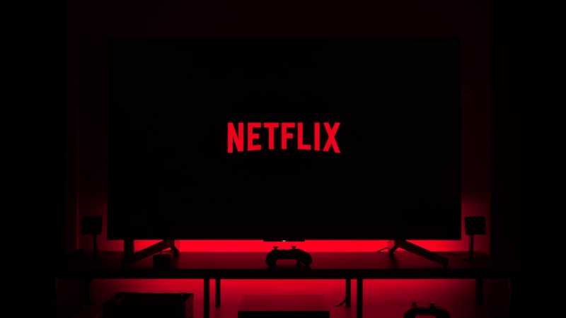 flat screen television displaying Netflix logo - Dark Netflix and Chill from home, tags: 40 - unsplash